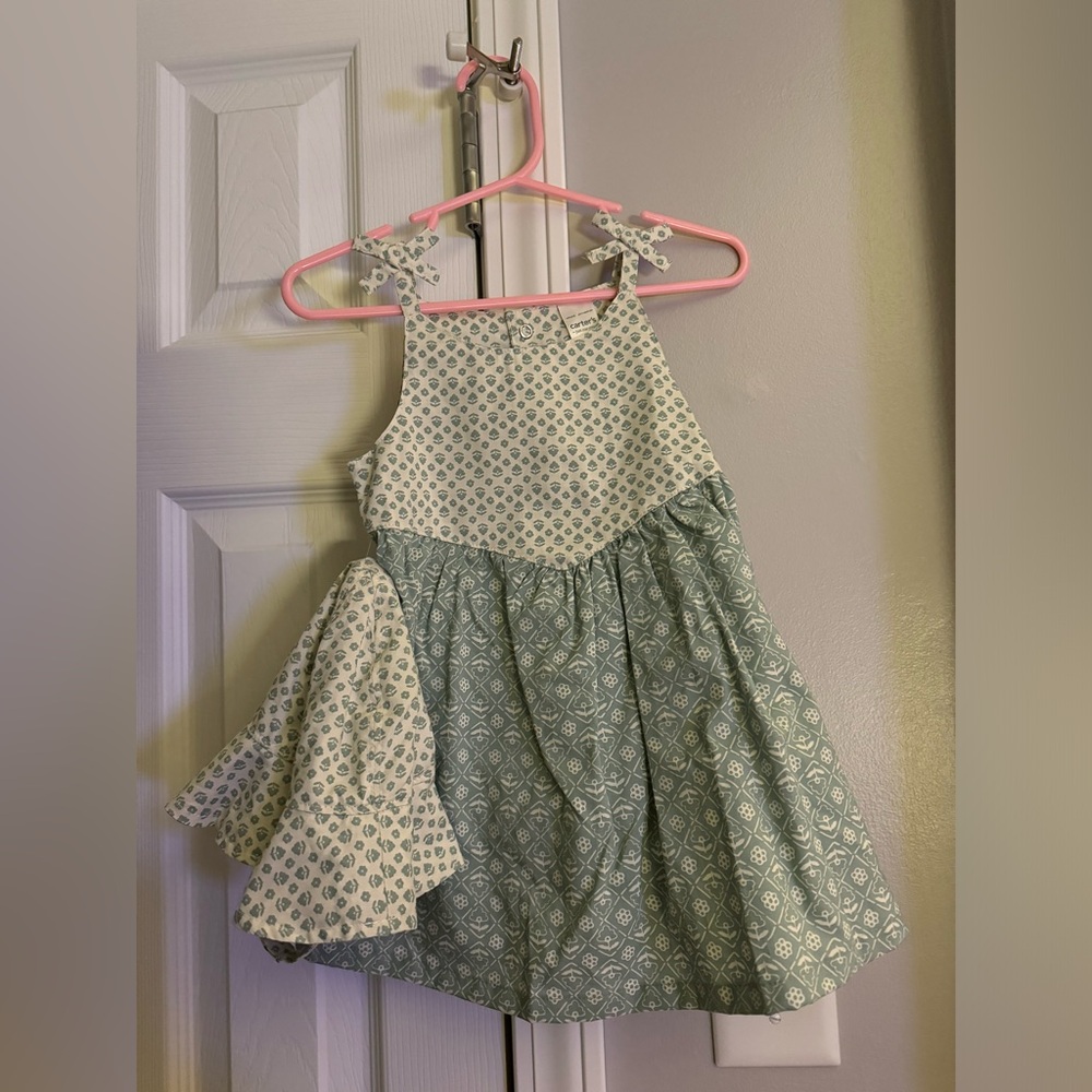 Dress with bottom underneath. A Hat that matches.
